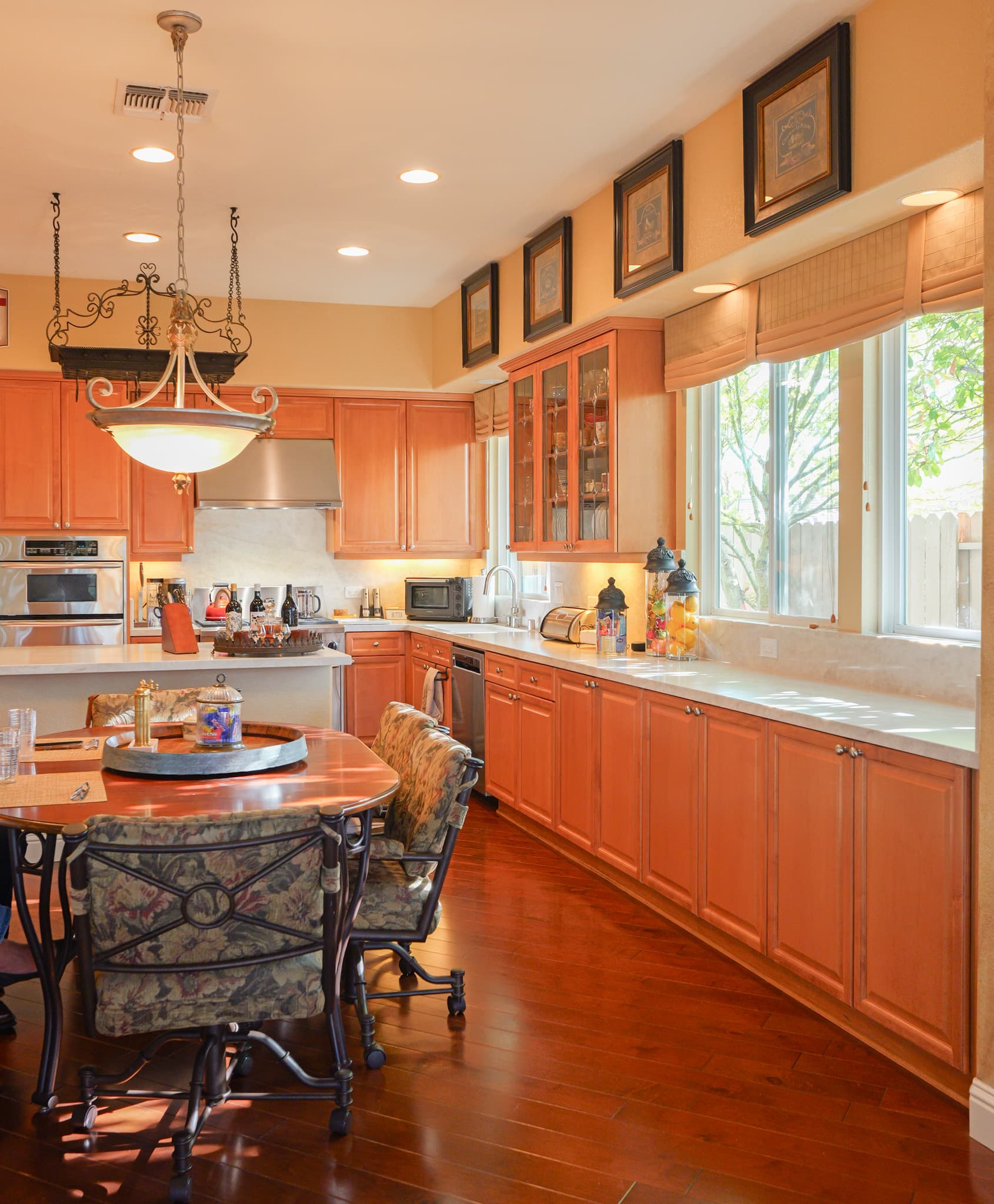 Kitchen Remodel in Roseville — refaced cabinets, quartz countertop, kitchen island